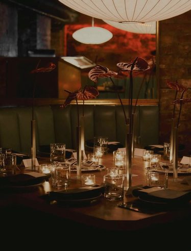 The dining room set for service